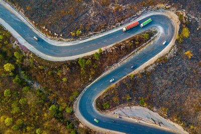 High angle view of highway amidst trees