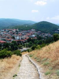 Scenic view of residential district against sky