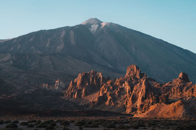 Scenic view of rocky mountains against sky