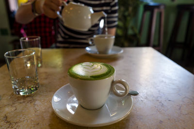 Coffee cup on table