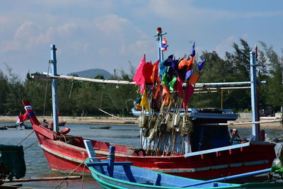 Fishing boat moored at harbor