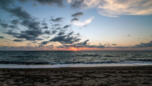 Scenic view of sea against sky during sunset