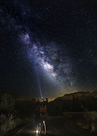 Scenic view of star field against sky at night