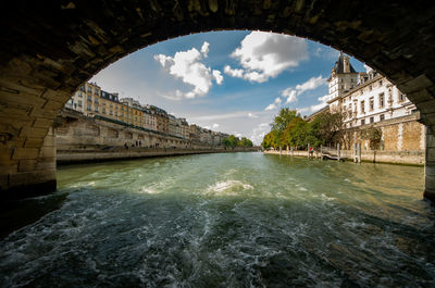 Arch bridge over river
