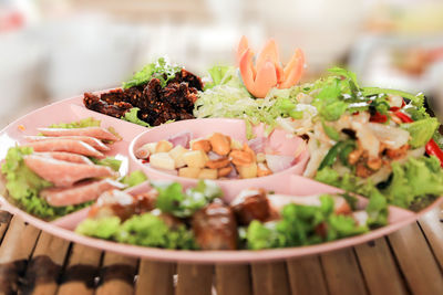 Close-up of food served on table