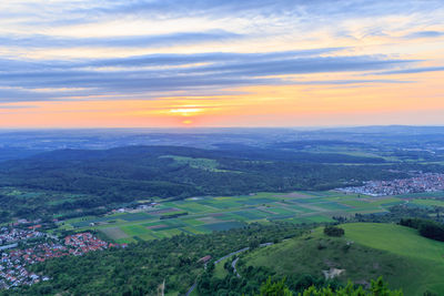 Scenic view of landscape against sky during sunset