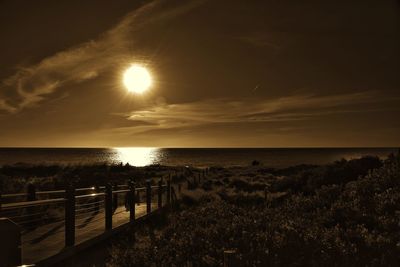 Scenic view of sea against sky at sunset