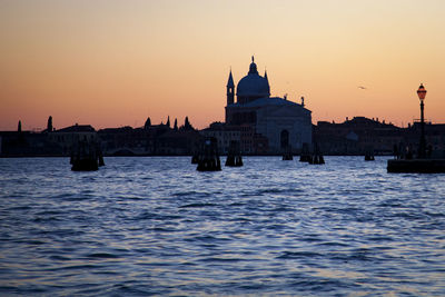 View of waterfront at sunset