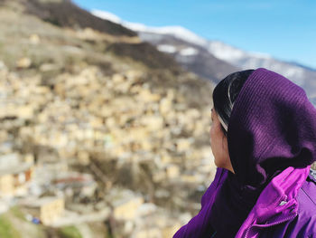 Rear view of woman looking at mountain