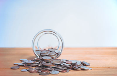 Close-up of coins on table