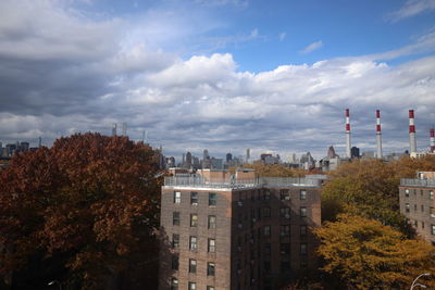 Buildings in city against sky