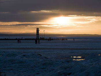 Scenic view of sea at sunset