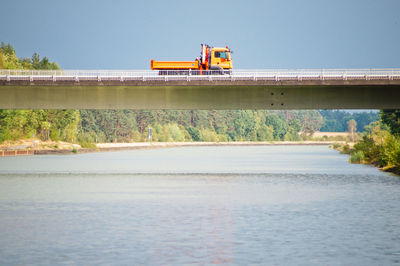 Bridge over river against sky