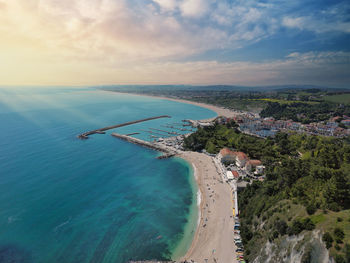 High angle view of sea against sky during sunset