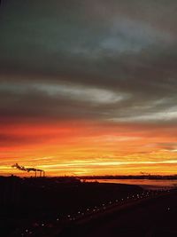 Dramatic sky over city during sunset