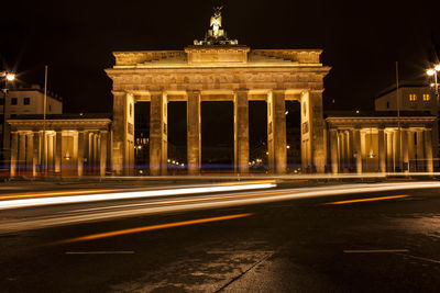 Light trails on city street at night