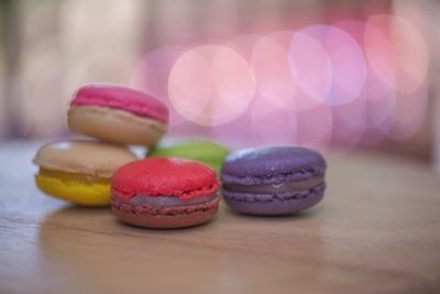 Close-up of multi colored candies on table