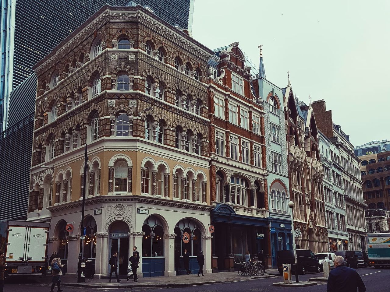 GROUP OF PEOPLE IN CITY STREET