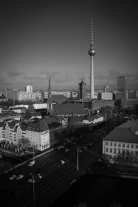 High angle view of fernsehturm amidst buildings in city against sky