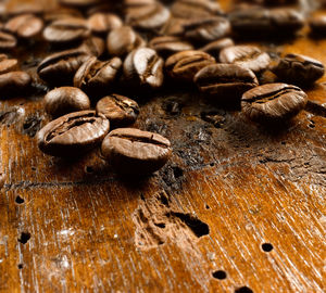 Close-up of coffee beans on table