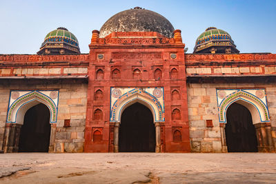 Mosque and tomb of isa khan of humayun tomb exterior view at misty morning from unique perspective