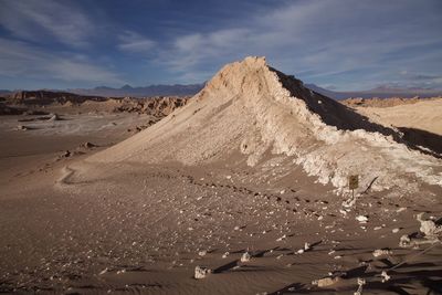 Scenic view of rock formations at desert against sky