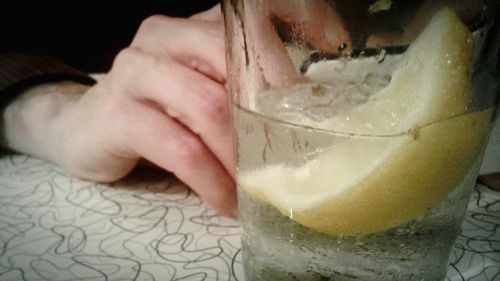 Close-up of hand holding drink