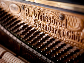 Close-up of text on piano