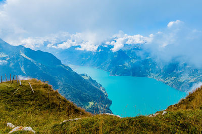 Panoramic view of lake and mountains against sky