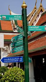 Low angle view of sign against building