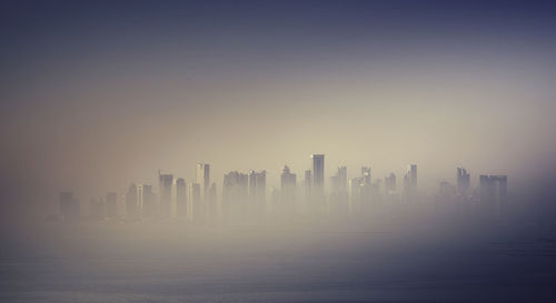 City skyline in foggy weather