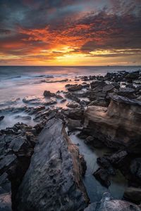 Scenic view of sea against sky during sunset