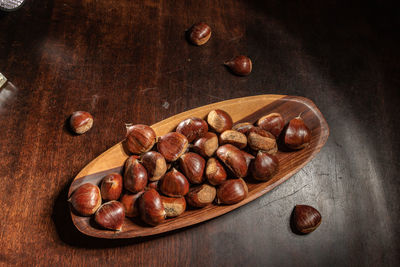 High angle view of roasted coffee beans on table