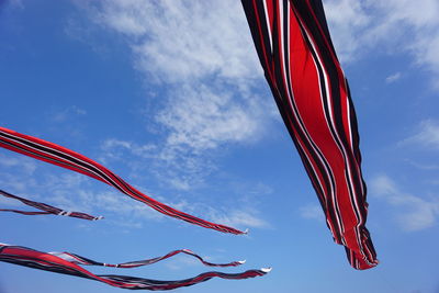 Low angle view of flag against sky