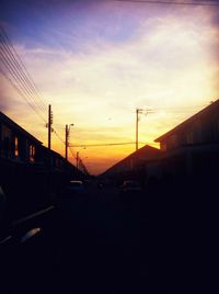 Silhouette of built structures at sunset