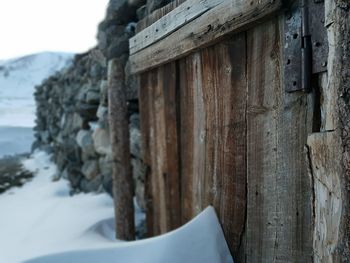 Close-up of snow on brick wall