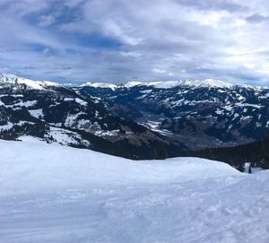 Scenic view of snowcapped mountains against sky