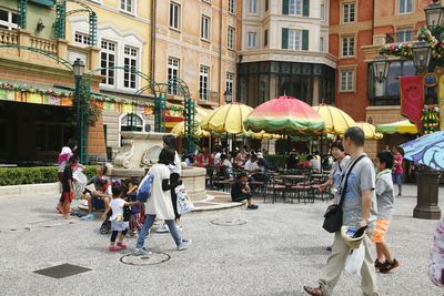 People on street in city