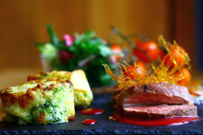 Close-up of burger in plate on table