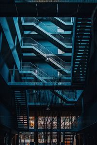 Low angle view of illuminated modern building at night