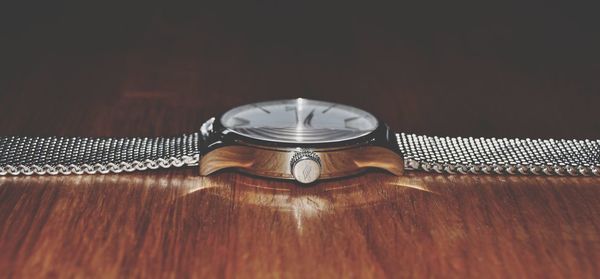 High angle view of clock on table