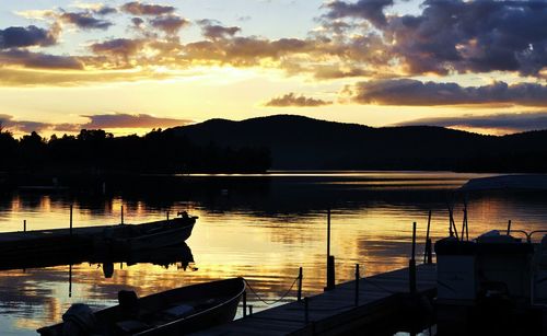 Scenic view of lake at sunset