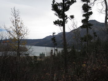 Scenic view of landscape and mountains against sky