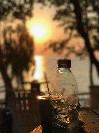 Close-up of wine bottles on table