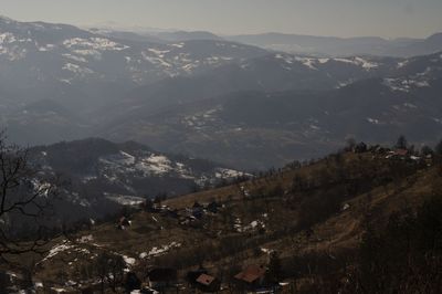 High angle view of townscape against mountain range