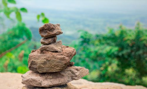Close-up of stone stack on rock
