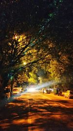 Light trails on street in city at night