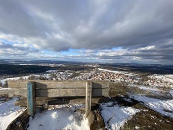 High angle view of snowcapped mountain against sky