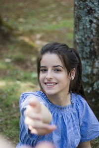 Portrait of a smiling young woman