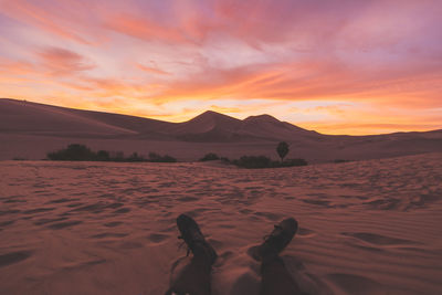 Scenic view of mountains against sky at sunset